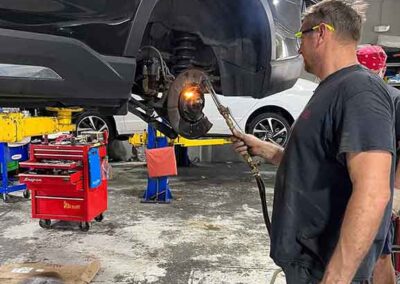 car-repair-shop-boca-raton-fixing-rusted-breaks-min